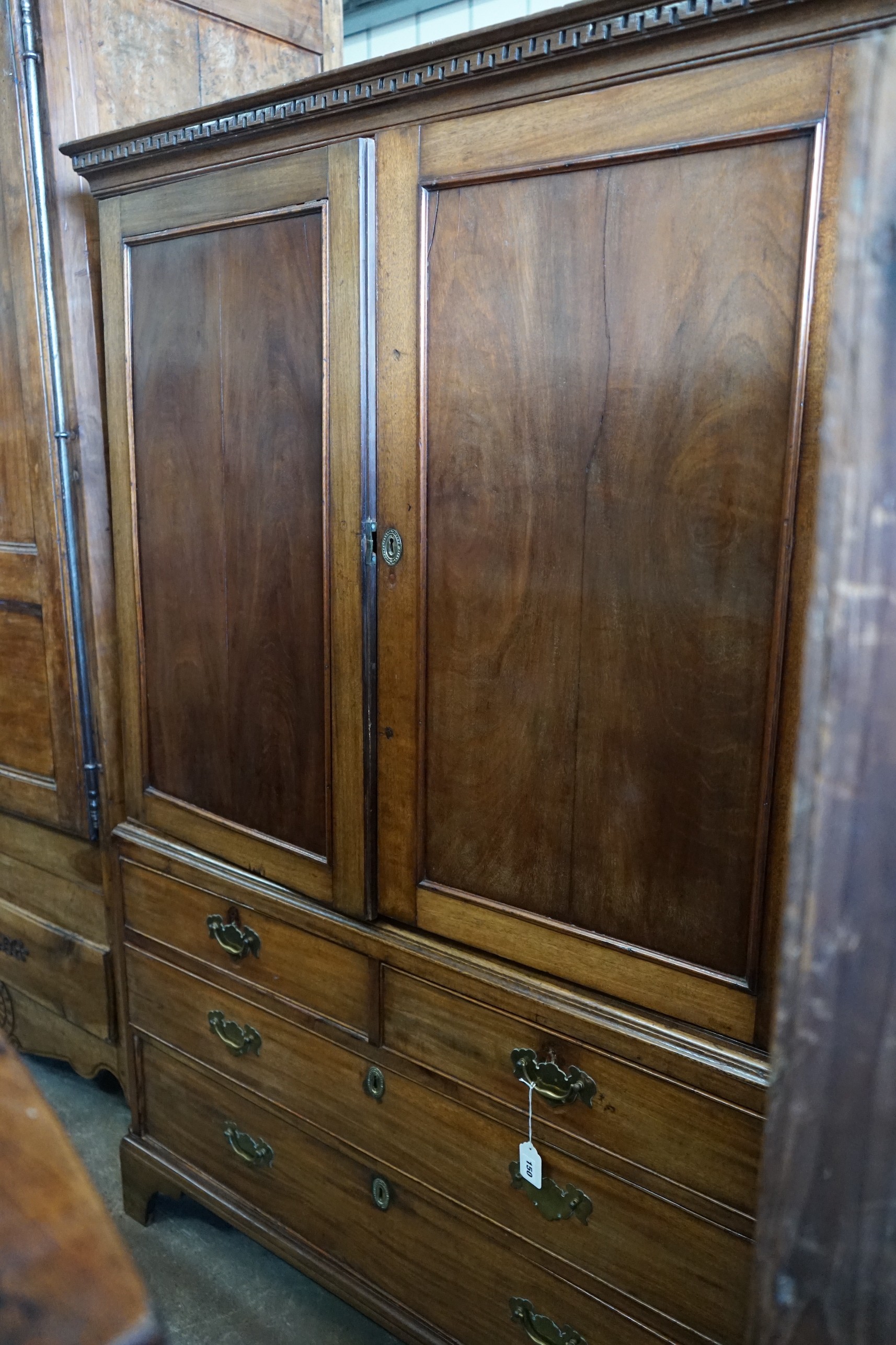 A George III mahogany linen press, width 119cm, depth 59cm, height 175cm